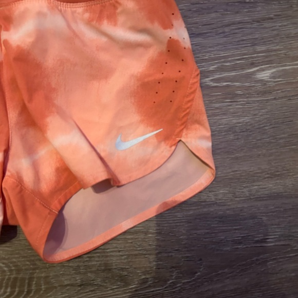 Nike Orange Athletic Shorts with Lightweight Fabric and Curved Hem - Picture 2 of 7